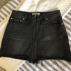 Black denim skirt.